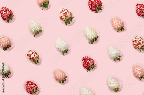 Chocolate dipped strawberries pattern on pink background