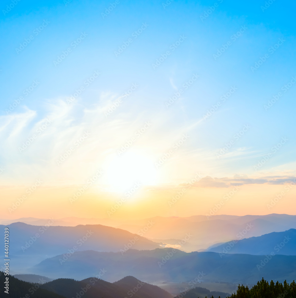 Obraz premium mountain valley in blue mist at the early morning, natural travel background