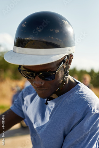 Portrait of young african american boy in safety helmet © Svitlana