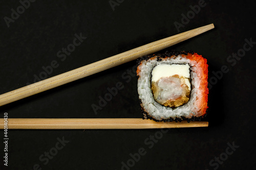 sushi on a black plate, japanese sushi food