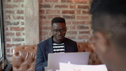 Two young African American having a business meeting.