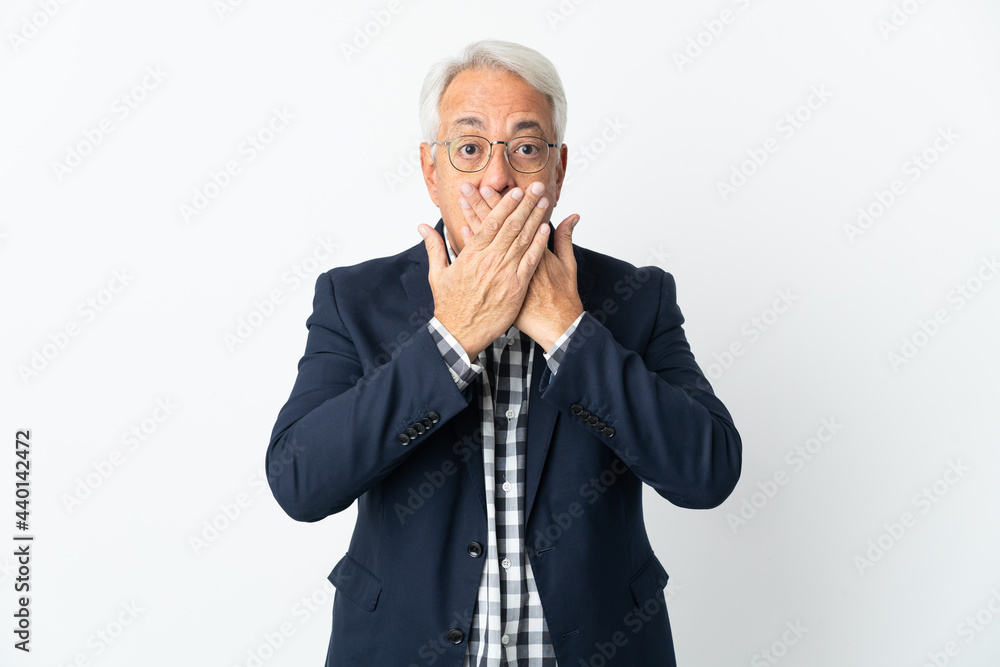 Middle age Brazilian man isolated on white background covering mouth with hands Middle age Brazilian man isolated on white background covering mouth with hands