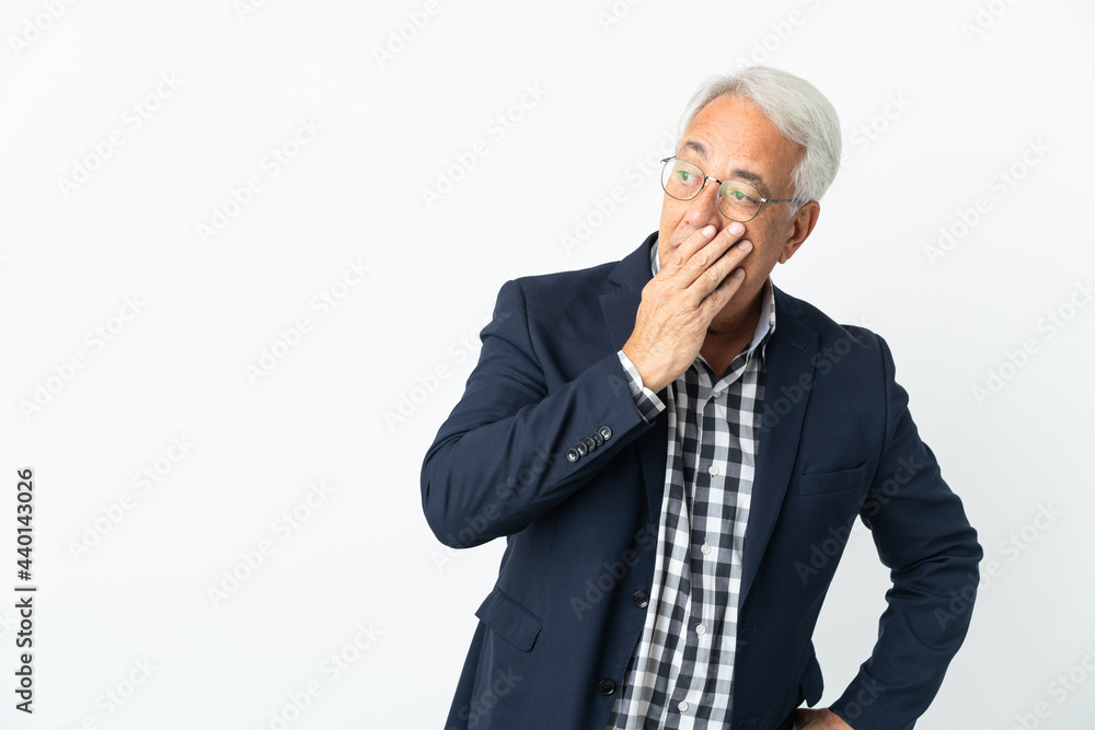 Middle age Brazilian man isolated on white background doing surprise gesture while looking to the side Middle age Brazilian man isolated on white background doing surprise gesture while looking to the side