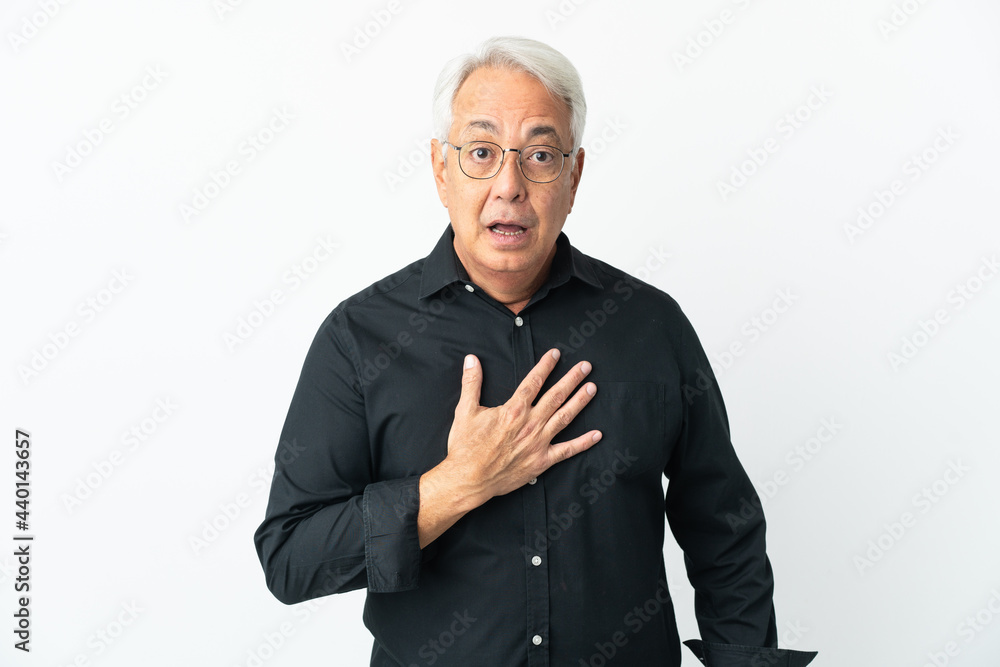 Middle age Brazilian man isolated on white background surprised and shocked while looking right Middle age Brazilian man isolated on white background surprised and shocked while looking right