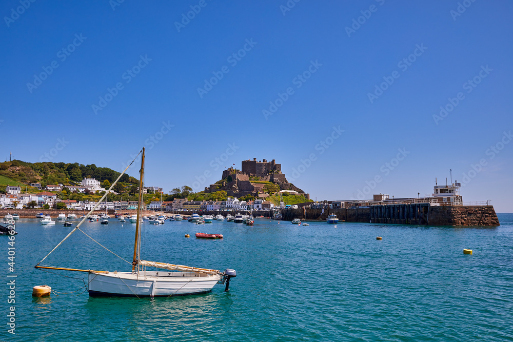 Image of Gorey Harbour with Gorey Castle in the background. Jersey CI