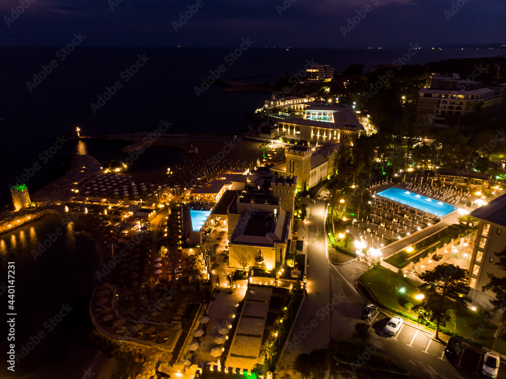 Fototapeta premium night evening drone view of hotel in Bulgaria, aerial view from above