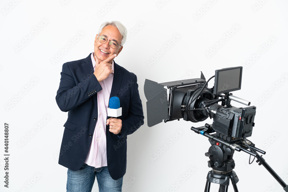 Reporter Middle age Brazilian man holding a microphone and reporting news isolated on white background happy and smiling Reporter Middle age Brazilian man holding a microphone and reporting news isolated on white background happy and smiling