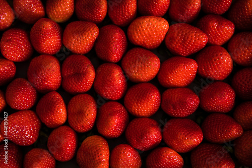 Full frame of fresh ripe strawberries photo