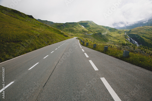 Austria, Carinthia, Grossglockner High Alpine Roadthrough among lush meadows photo