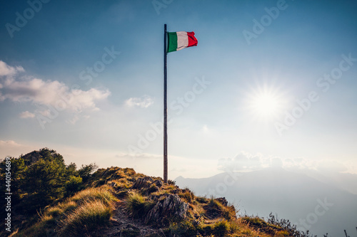 Italy, Lombardy, Italian flag on top of Monte Legnoncino photo