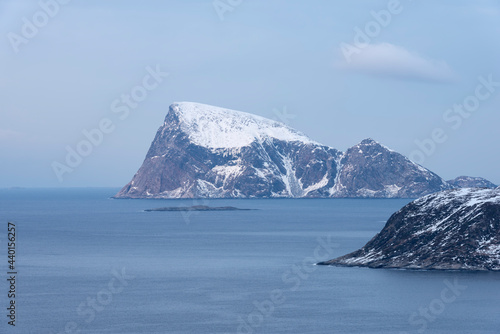 Norway, Tromso, Sommaroy, Snowcapped mountain at Haja Island photo