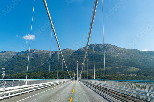 Norway, Empty highway of Hardanger Bridge on sunny day photo