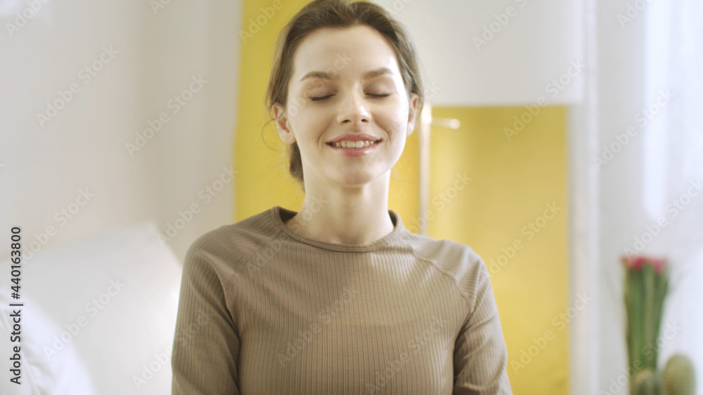 An attractive woman is relaxing on the sofa An attractive woman is relaxing on the sofa