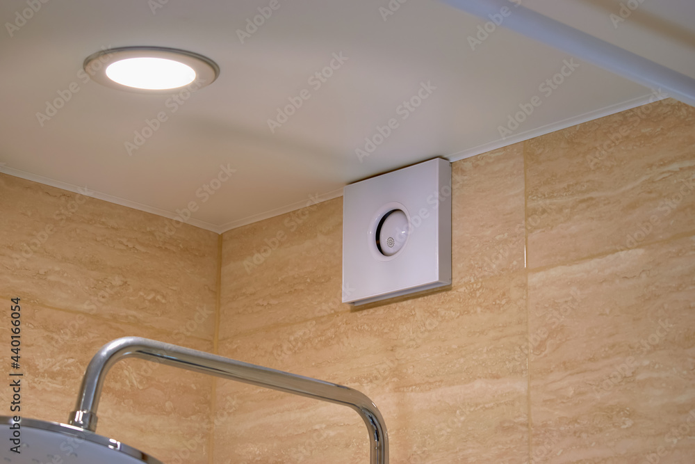 Electric extractor hood in the bathroom. Electric exhaust fan ...