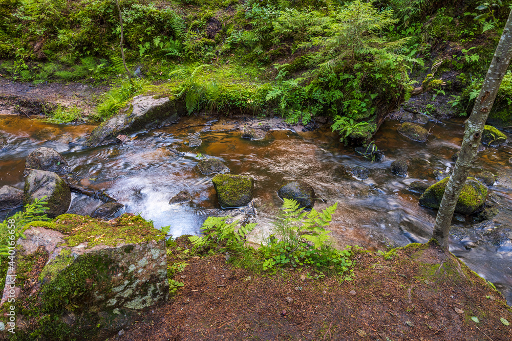 Beautiful nature landscape view with water streaming over rocks. Sweden. Beautiful nature landscape view with water streaming over rocks. Sweden.