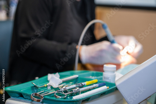 Dental Hygienist working on patient