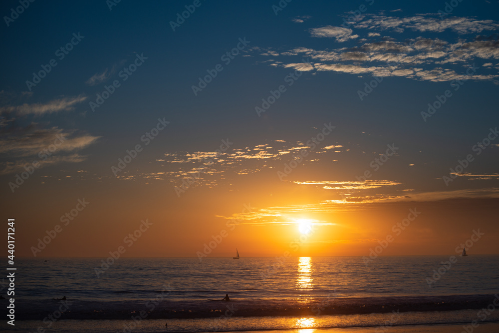 Sunset at the sea. Sunrise on beach. Colorful ocean, nature landscape background with copy space.