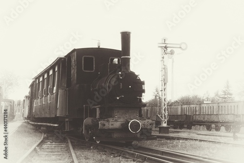 a photo of the narrow-gauge railway, stylized as an old photograph 