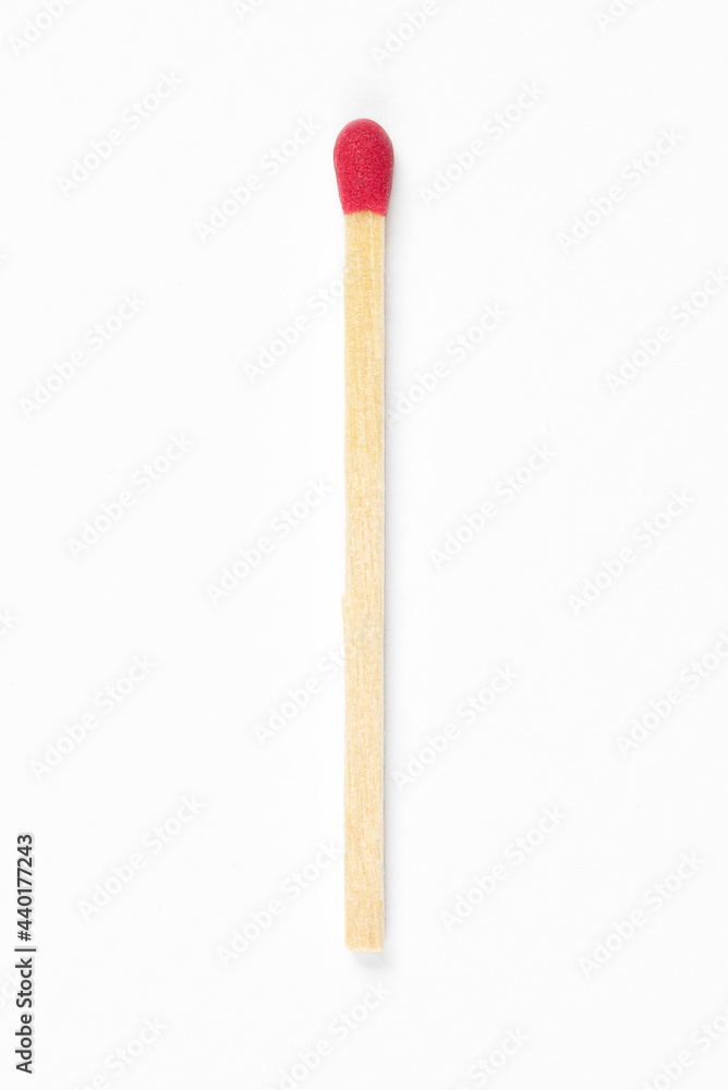 Top view close up macro photo of single matchstick isolated on white background. Smooth highlight and shadow by studio flash light. Top view close up macro photo of single matchstick isolated on white background. Smooth highlight and shadow by studio flash light.