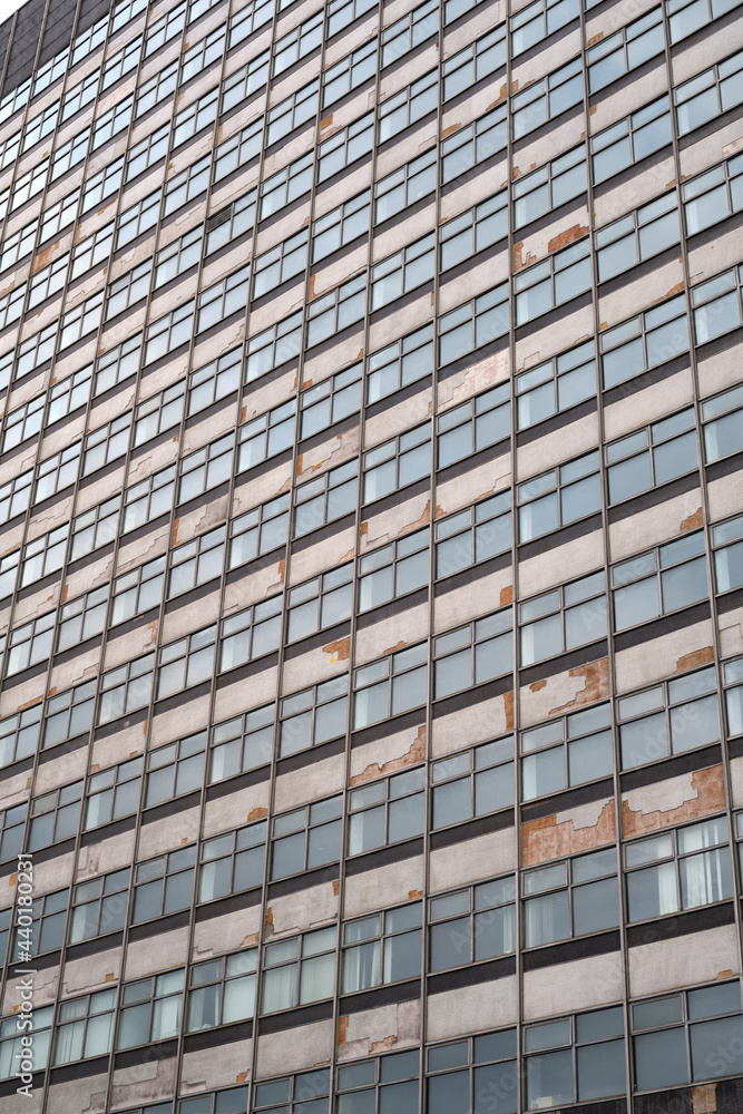 Close-up of weathered post-war modernist building exterior. Close-up of weathered post-war modernist building exterior.