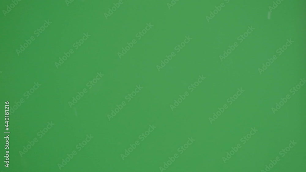 Isolated falling snow on green screen Isolated falling snow on green screen
