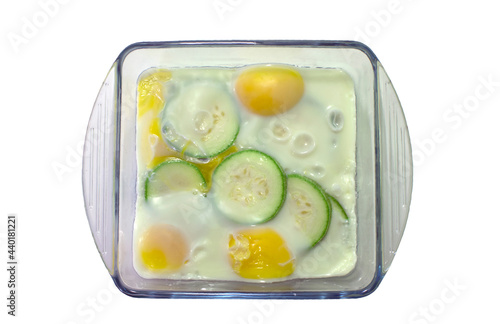 Slices of zucchini or squash baked in the microwave with egg omelet. Diet food with a low insulin and glycemic index for weight loss. photo