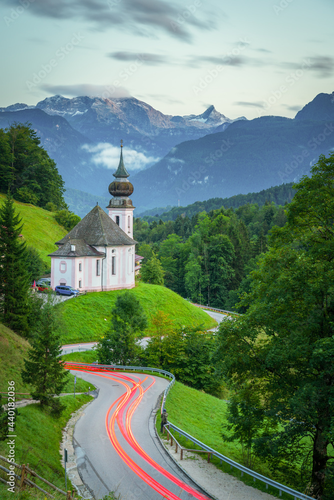 Maria Gern church at dusk with famous Watzmann summit in the background Berchtesgadener Land, Bavaria, Germany