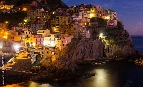 Small picturesque Italian town of Manarola in evening lights