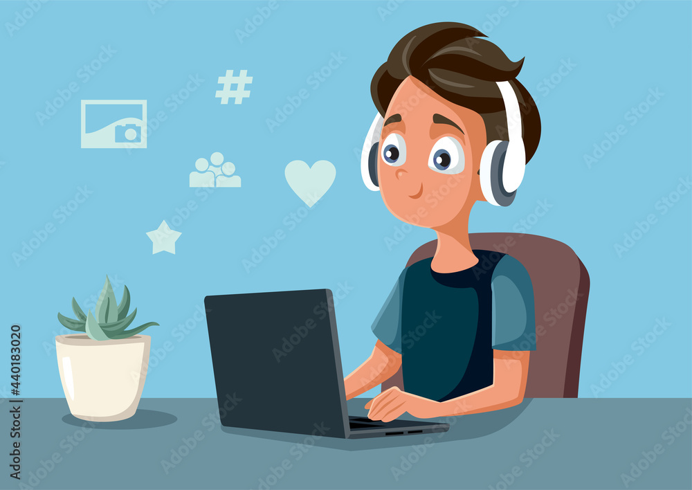 Teen Boy Spending Time on Social Media on His Laptop Teen Boy Spending Time on Social Media on His Laptop