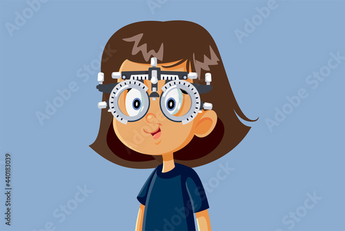 Little Girl Undergoing Eye Test with Phoropter
