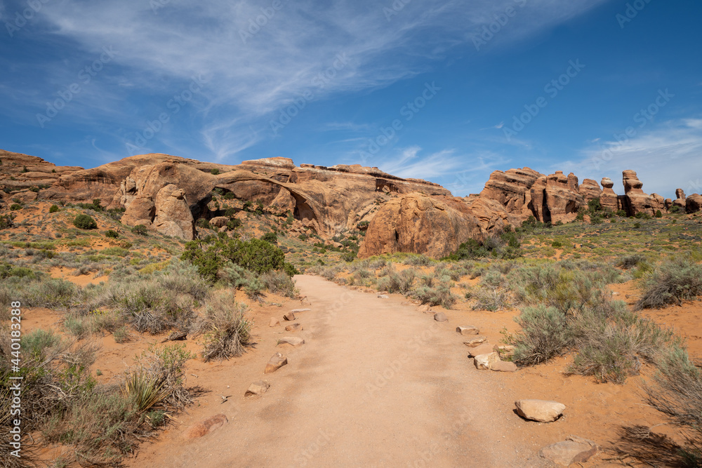 Scenery along the Devils Garden and Landscape Arch trail in Arches National Park in Utah on a sunny day