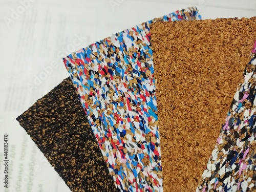 Samples of cork underlay for laminate. Wood backing for floor coverings. photo