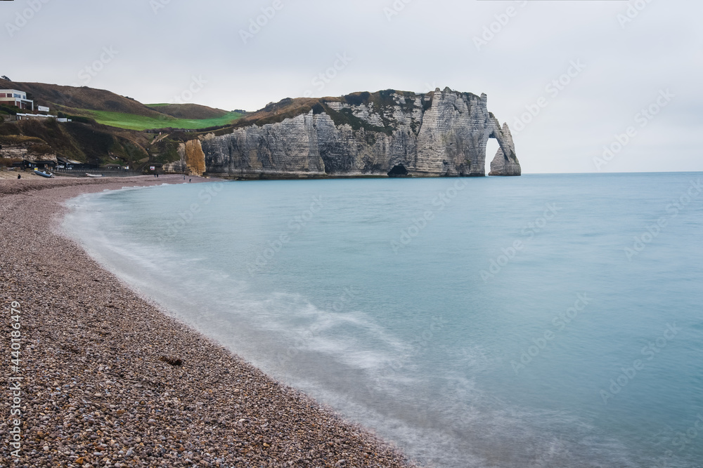 Famous Etretat Aval cliff and natural arch landmark by the ocean in ...