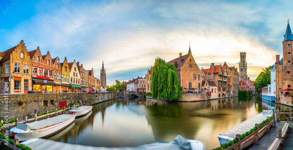 Brugge city centre with famous Rozenhoedkaai at sunset, West Flanders province, Belgium