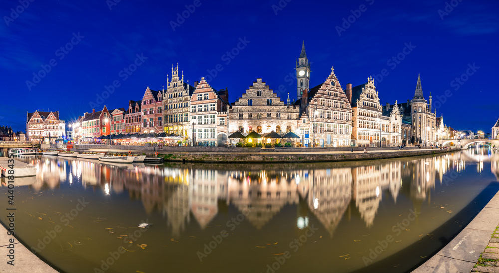 Evening panorama of Graslei, Korenlei quays and Leie river in the historic city center in Ghent (Gent), Belgium