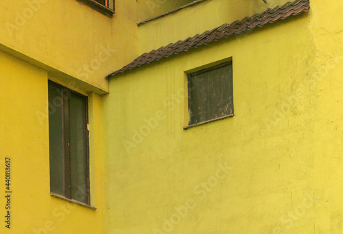 Details of the facade of a yellow building