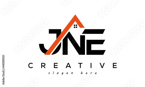 initial JNE letters real estate construction logo vector photo