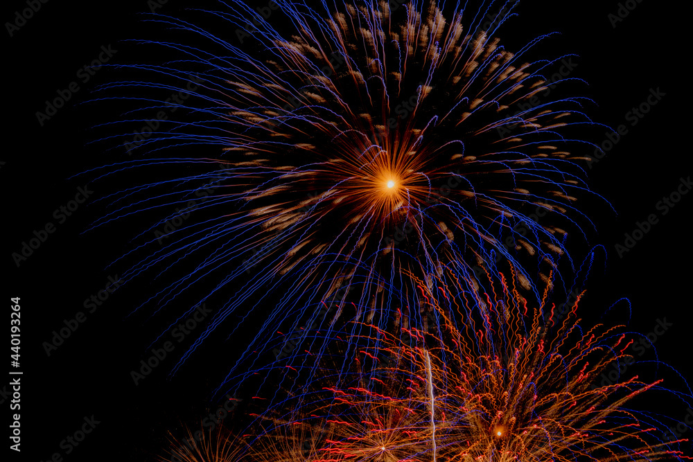 Fireworks in night sky, to celebrate a holiday, seasonal or special event.