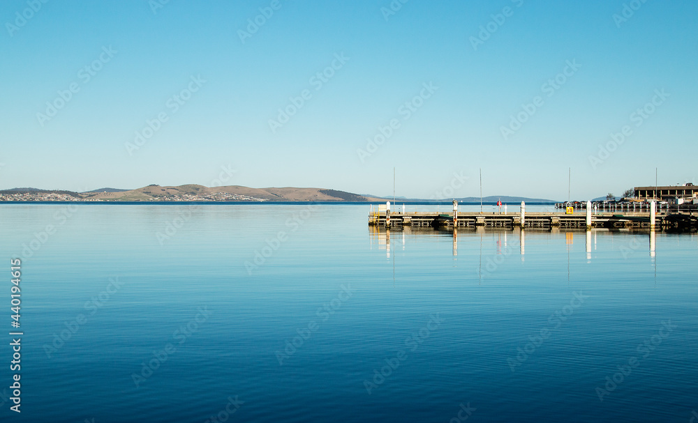 Glassy blue water in harbour