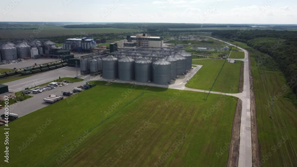 long rows of huge white gas tanks connected with pipeline system at refinery plant on sunny day aerial view long rows of huge white gas tanks connected with pipeline system at refinery plant on sunny day aerial view