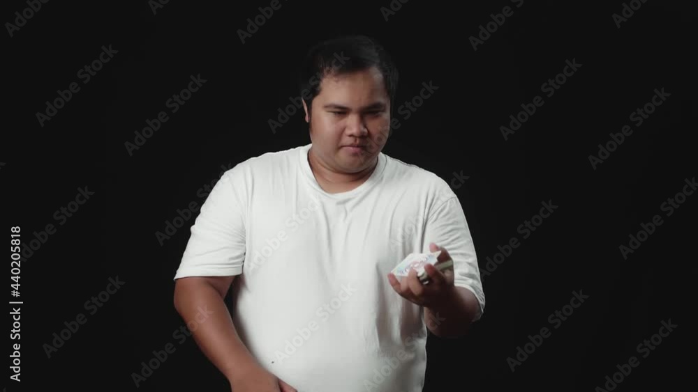 Asian Magician Starts Showing His Trick, Throwing Cards. Slow Motion
Asian Magician Starts Showing His Trick, Throwing Cards. Slow Motion