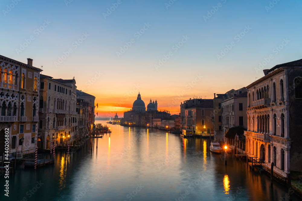 Beautiful sunrise view of Grand Canal and Basilica Santa Maria della Salute in Venice, Italy