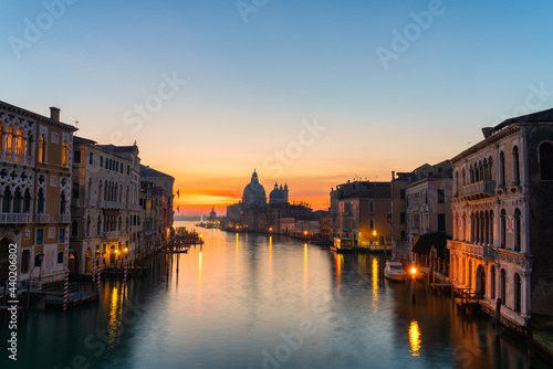 Beautiful sunrise view of Grand Canal and Basilica Santa Maria della Salute in Venice, Italy © Pawel Pajor