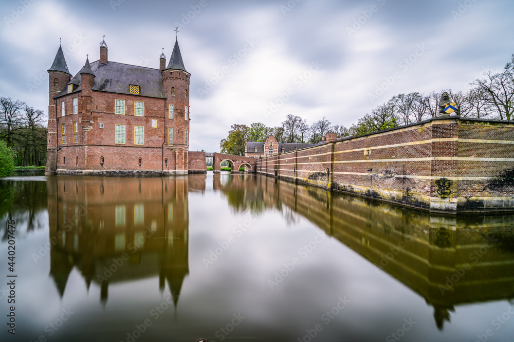 An ancient Dutch castle reflected in the pond
