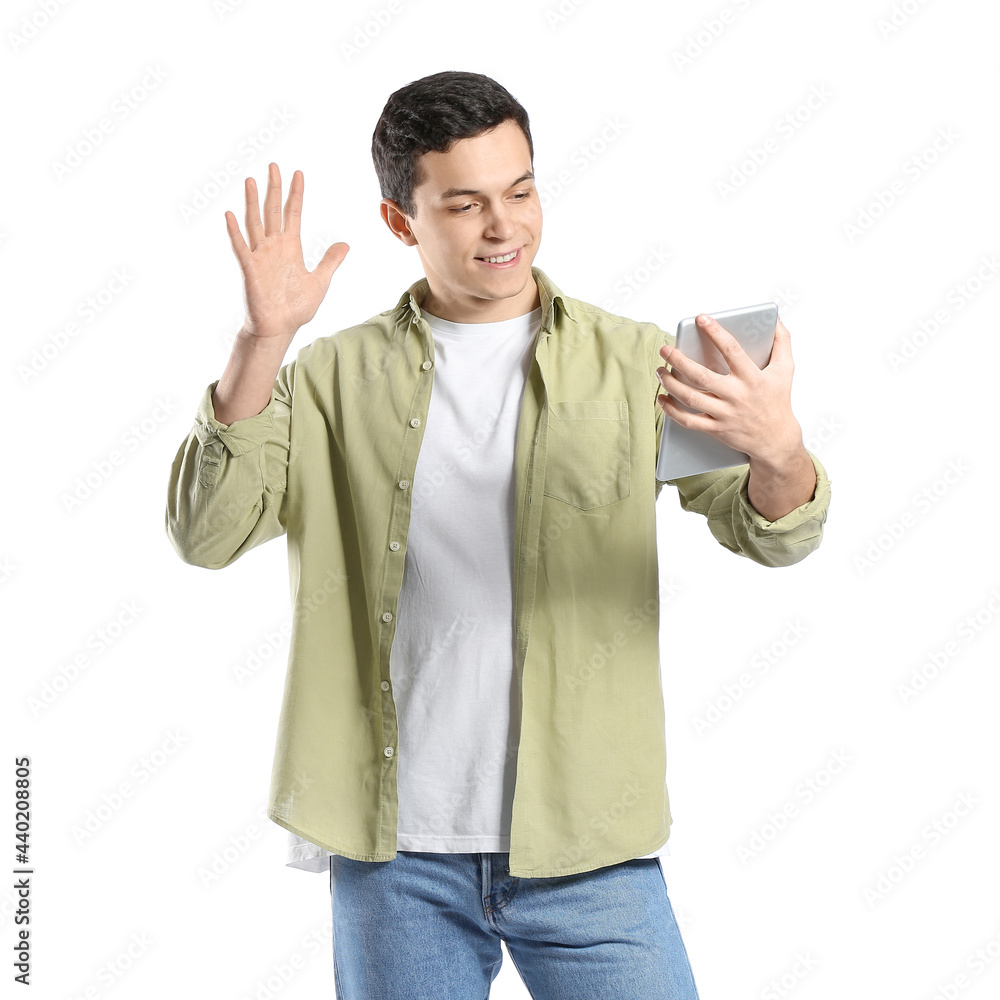 Young man with tablet computer on white background Young man with tablet computer on white background