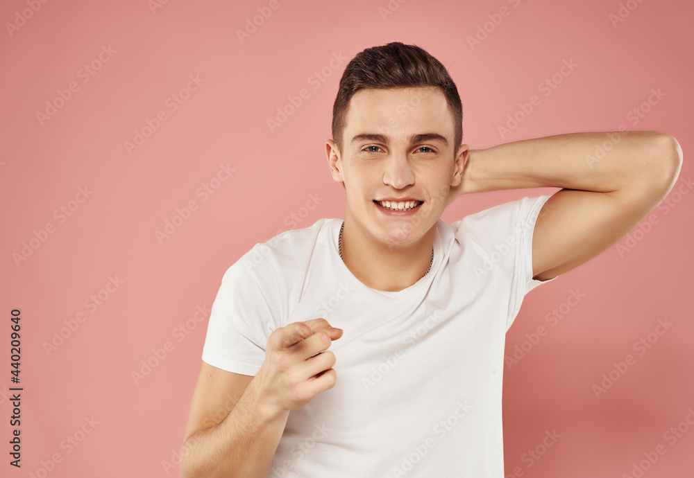 emotional man in white t-shirt hand gestures fun pink background emotional man in white t-shirt hand gestures fun pink background