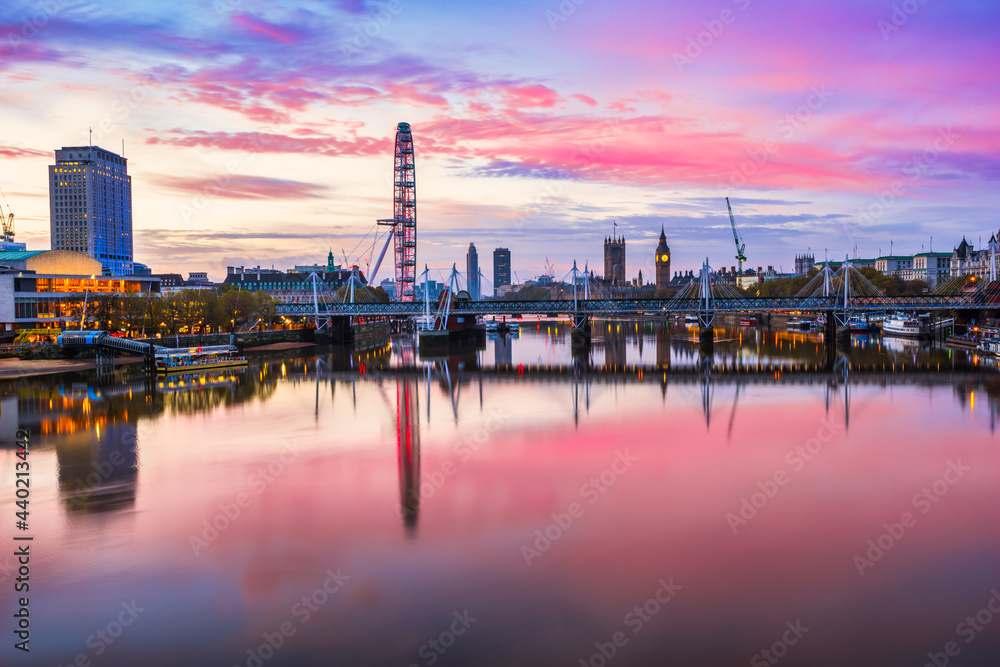 Beautiful sunrise of river Thames overlooking Jubilee bridge and Big Ben clock in London. England