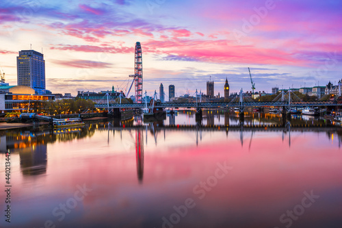 Beautiful sunrise of river Thames overlooking Jubilee bridge and Big Ben clock in London. England