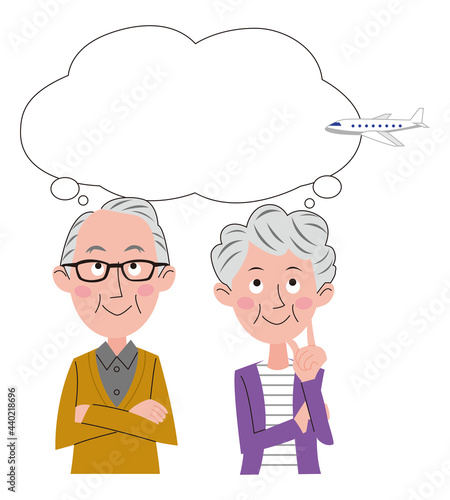 飛行機旅行を計画しているシニア夫婦