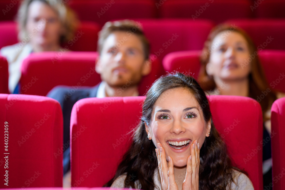 woman happy to watch the show bright positive emotions woman happy to watch the show bright positive emotions
